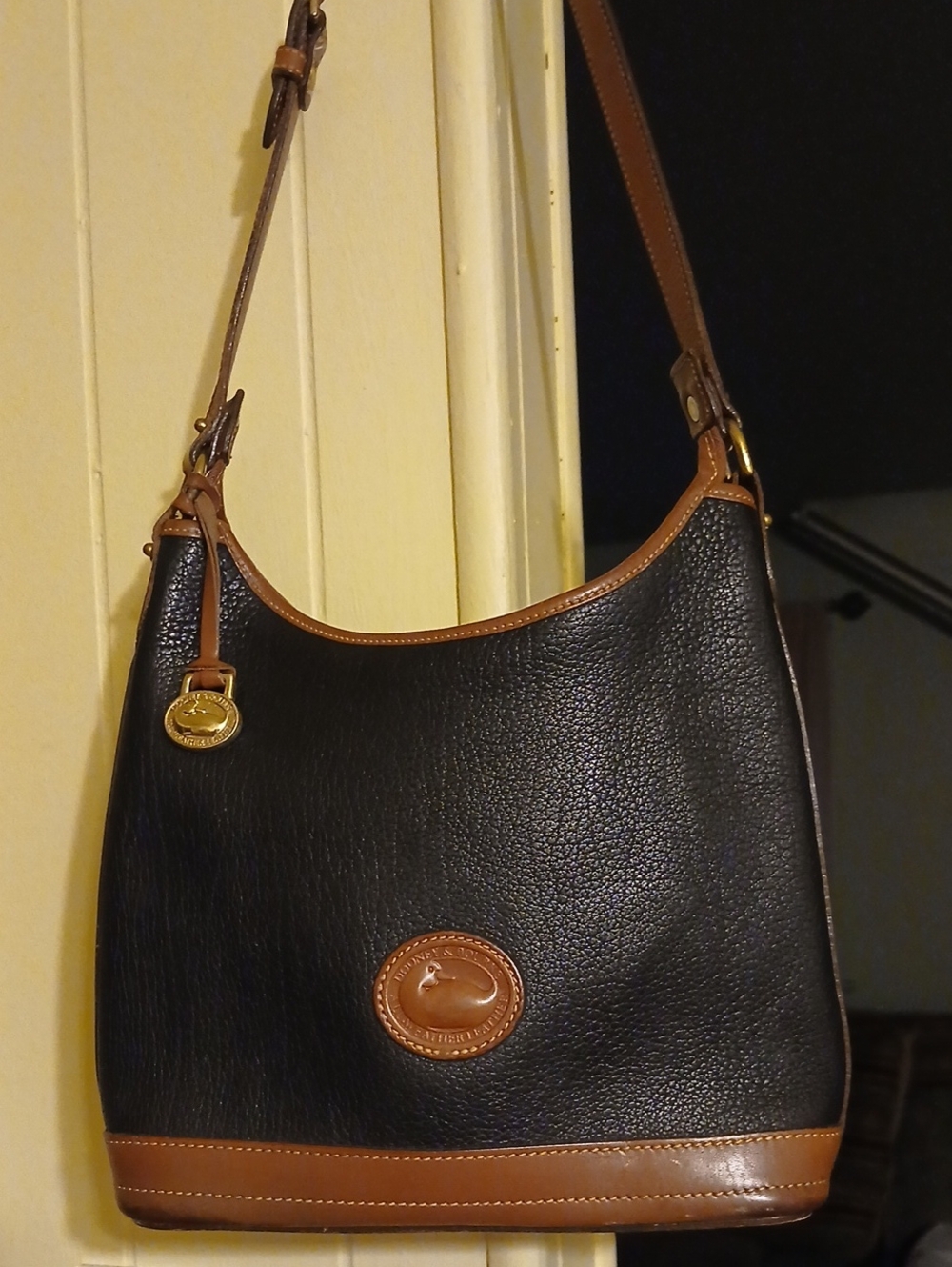 Dooney&Bourke Black and Brown Pebbled Leather Shoulder Bag with Contrast Trim